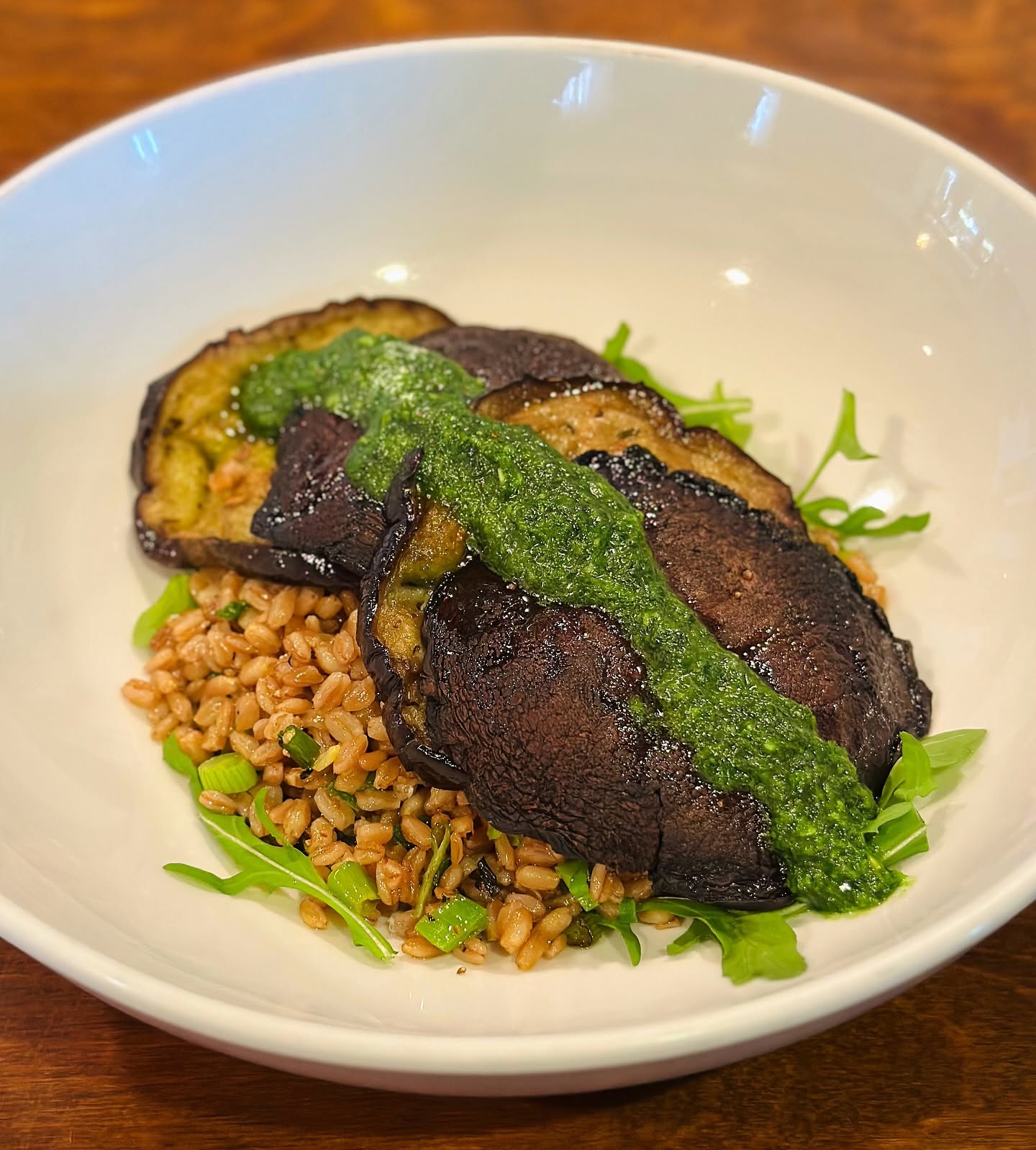 Grilled eggplant with pesto over farro