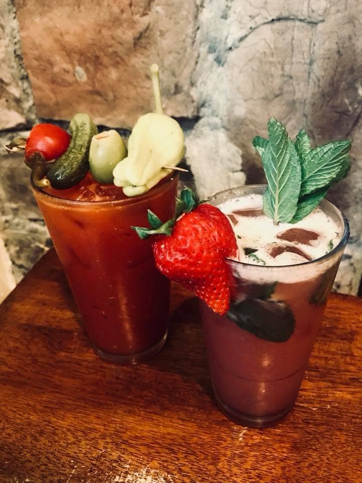 A bloody mary and a strawberry mojito