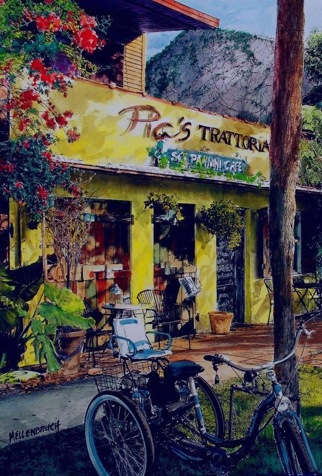 Bicycles parked outside the Trattoria's yellow front on Beach Blvd S