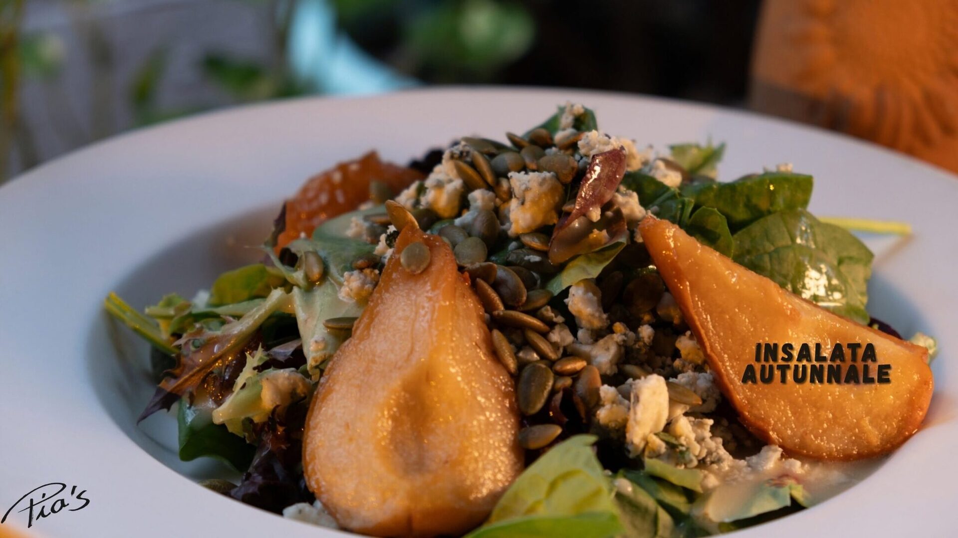 Insalata autunnale with roasted pear and pumpkin seeds